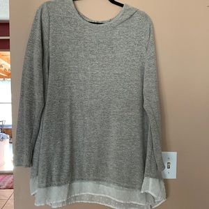 Women's long gray sweater.